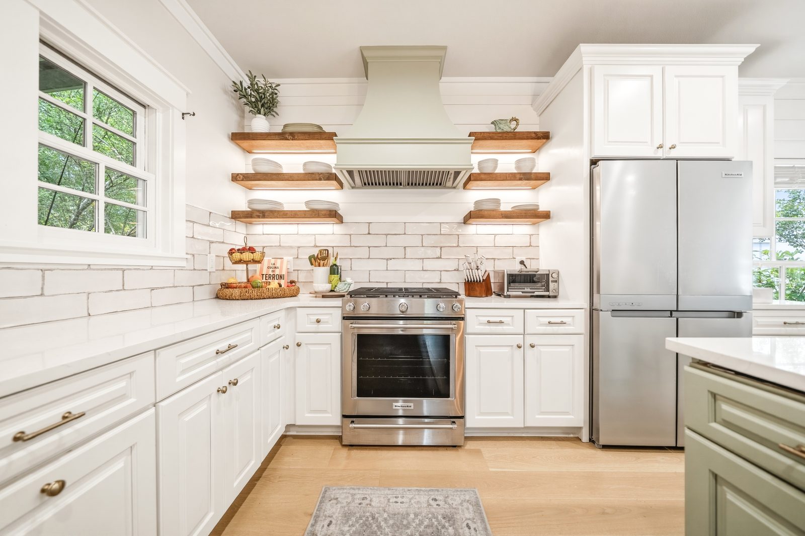 Farmhouse style kitchen with shiplap and open shelving