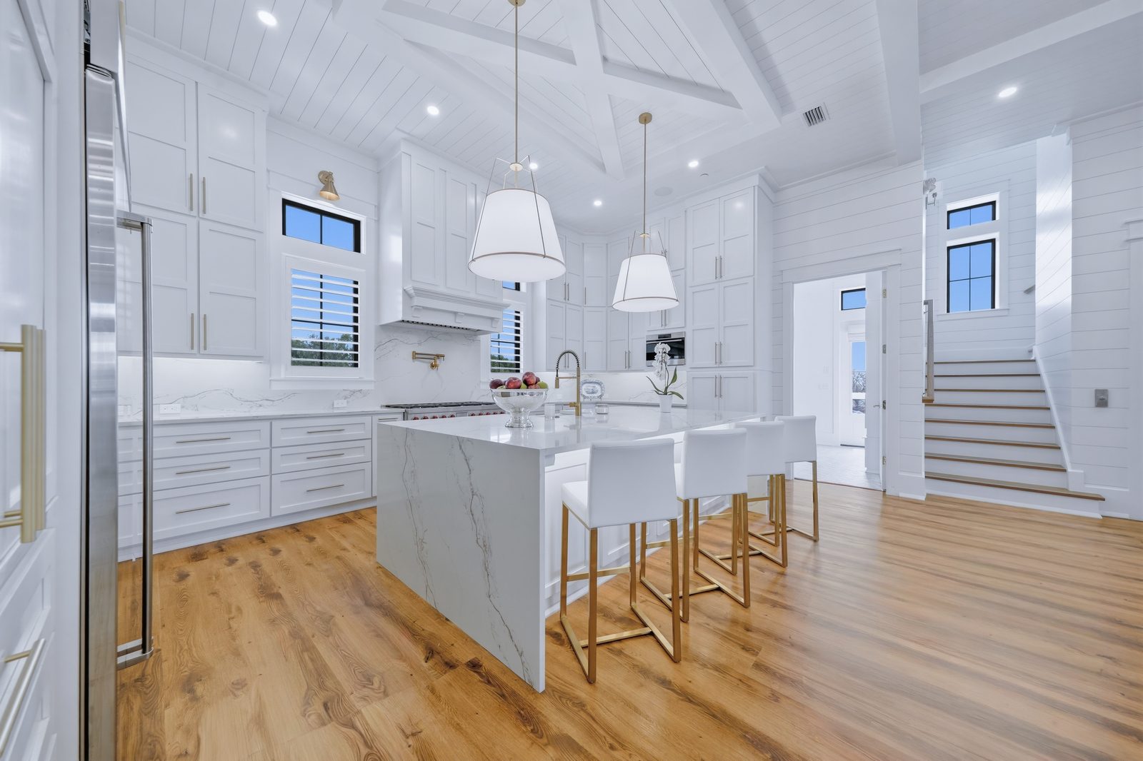 Vaulted ceiling kitchen with marble island